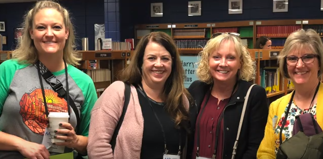 Granite librarians Amber Palmer, Heidi Williams, Cindy Moyle, and Michelle Asay visit a school library in Louisville in a video from Jefferson County Public Schools
