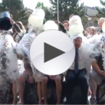 Photo of superintendent and Olympus High SBOs pouring ice water over heads