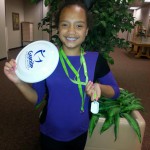 Photo of student with Play Unplugged prize