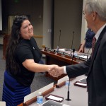 Photo of teacher shaking hands with administrator