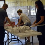 Photo of volunteers distributing supplies at Kearns Jr. High