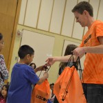 Photo of Jackling Elementary students receiving backpacks