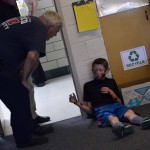 Photo of Mill Creek student participating in mock disaster drill