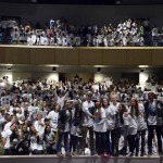 Photo of Olympus High students standing in auditorium