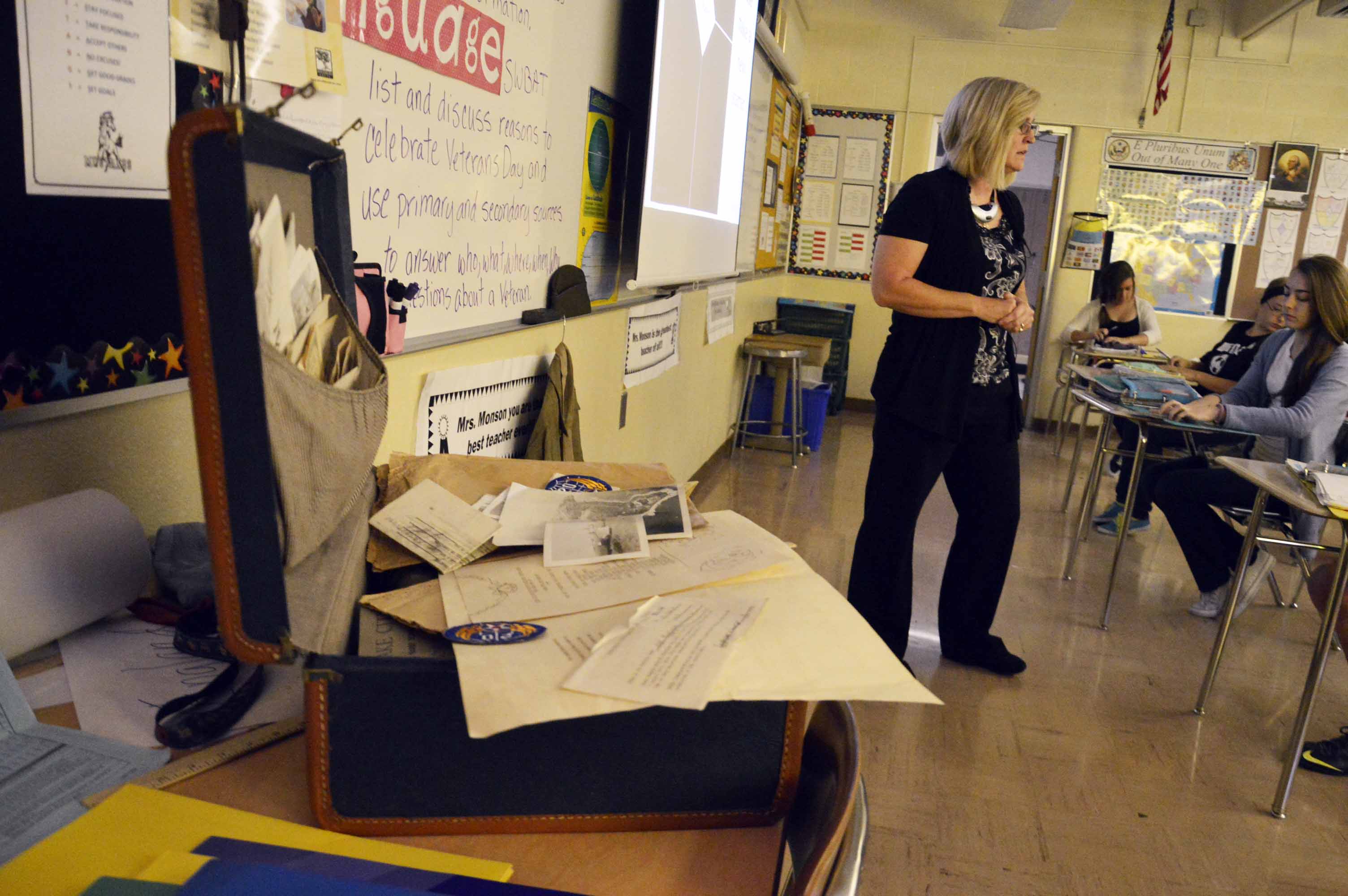 West Lake teacher uses suitcase full of WWII artifacts for Veterans Day lesson