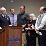 Photo of classified employees being honored during board meeting