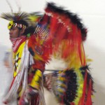Photo of student performing Native American dance