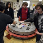 Photo of Hunter High Robotics Club members with donated robot