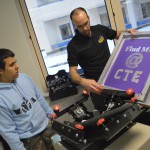 Photo of GTI student and teacher creating screen print
