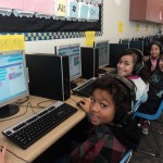 Photo of students learning computer code during Hour of Code event