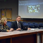 Photo of two administrators presenting to board of education