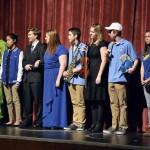 Photo of Taylorsville High athletes standing on stage