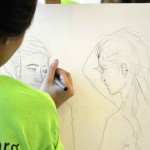 Photo of student drawing during Art Night Live