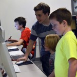 Photo of students exploring graphic design programs at CTE Open House