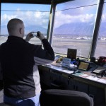 Photo of teacher inside air traffic control booth