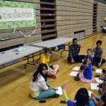 Photo of Kearns Network kindergarteners playing games with Kearns High students