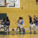 Photo of girls all stars playing basketball