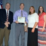 Photo of Golden Apple PTA Award recipient posing with Region 5 PTA members