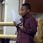 Photo of Granger Elementary student reciting poem
