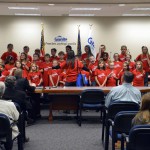 Photo of Neil Armstrong Academy choir singing at board meeting