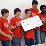 Photo of Wasatch Jr High students receiving large check