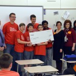 Photo of Wasatch Jr High students receiving large check