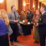 Photo of employee talking with superintendent at 25 Year Celebration