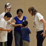Photo of Whittier volunteers and students participating in sensory activity