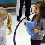 Photo of Jackling Elementary student holding new book