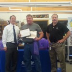 Photo of employee receiving district Wellness award