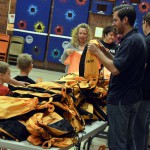 Photo of Jackling students receiving donated backpacks