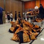 Photo of Jackling students receiving donated backpacks