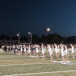 Photo of Taylorsville High dancers performing on football field