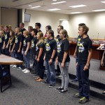 Photo of Taylorsville High madrigals performing at board meeting