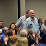 Photo of Maintenance staff standing to be recognized by board of education