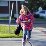 Photo of Magna Elementary student riding scooter