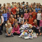 Photo of Elk Run students with pile of donated socks