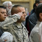Photo of veterans saluting American flag