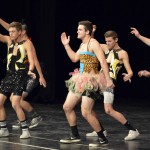 Photo of Cottonwood High students dancing on stage