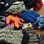 Photo of pile of gloves on table