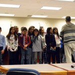 Photo of Granger Elementary chorus performing at board meeting