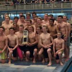 Photo of Skyline High boys swim team posing with trophy