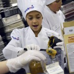 Photo of Future Chefs participant measuring ingredients
