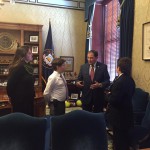 Photo of two Matheson Jr High students speaking with Utah governor