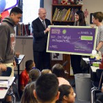 Photo of Rolling Meadows Elementary teacher being announced as Excel Award recipient