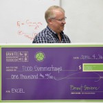Photo of Olympus High teacher being announced as Excel Award recipient