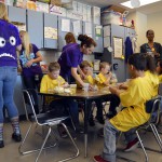 Photo of Whittier Elementary students doing activities on table