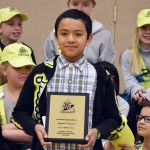 Photo of Whittier Elementary student receiving Safety Patrol award