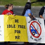 Jefferson Jr High students hold sign encouraging idle-free habits
