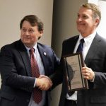 Superintendent Dr. Martin Bates receives the Superintendent of the Year award